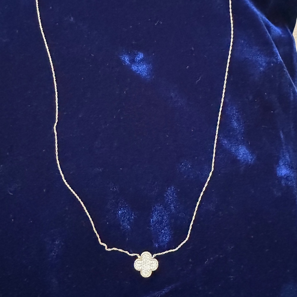Gold colored clover diamond pave necklace